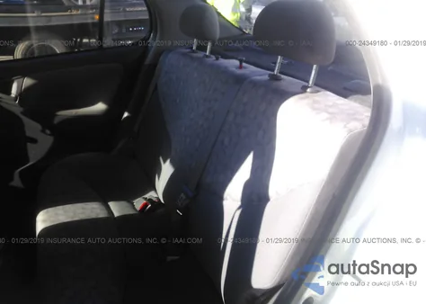 2000 Toyota Echo from USA, damaged, VIN JTDBT1237Y5000427